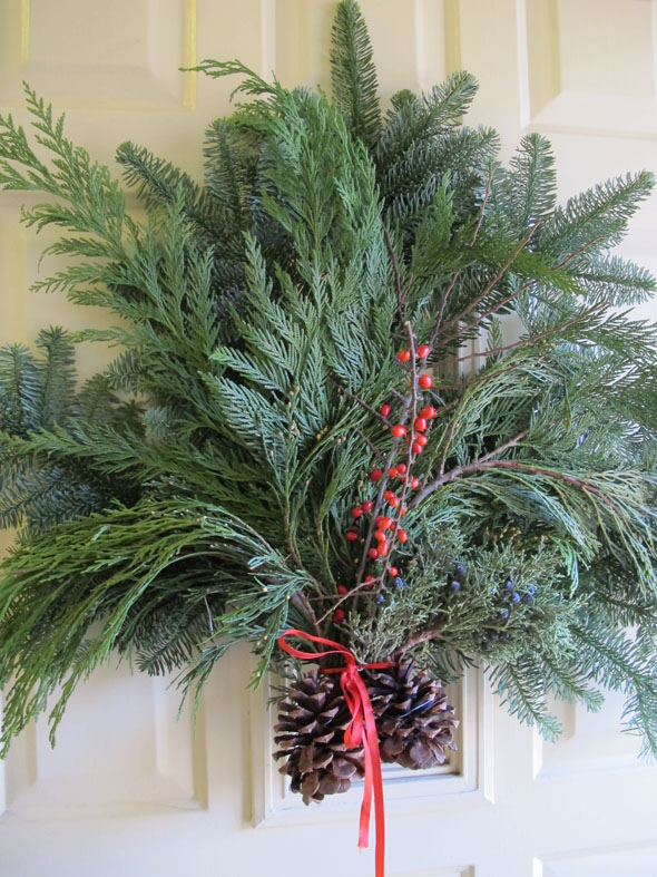 Christmas door decoration, wreath, cedar boughs, pine
